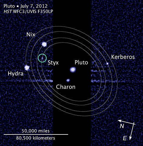 "Pluto moon P5 discovery with moons' orbits" by NASA, ESA, and L. Frattare (STScI) - http://hubblesite.org/newscenter/archive/releases/2012/32/image/c/. Licensed under Public domain via Wikimedia Commons - http://commons.wikimedia.org/wiki/File:Pluto_moon_P5_discovery_with_moons%27_orbits.jpg#mediaviewer/File:Pluto_moon_P5_discovery_with_moons%27_orbits.jpg